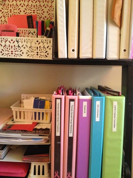 Color coded notebooks keep this designer's desk creative!