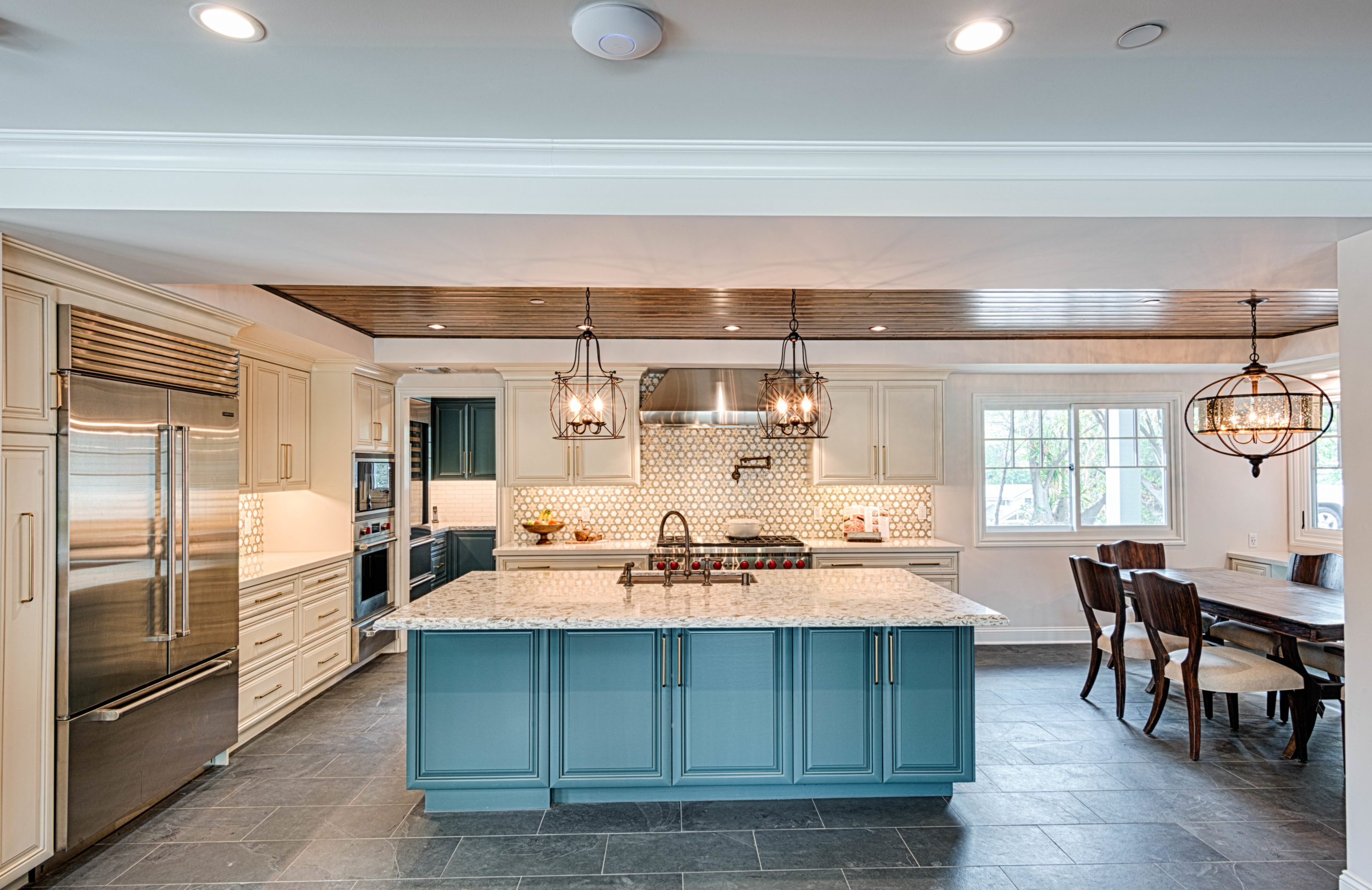 Blue and White and Wood Kitchen with slate flooring