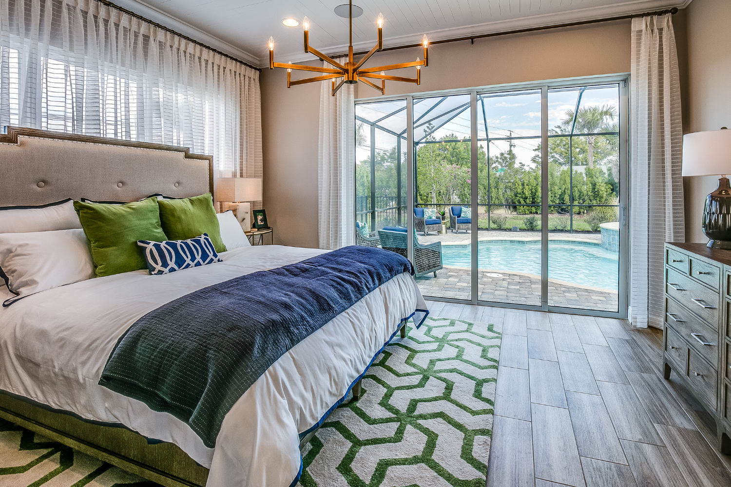 pamela-sandall-malibu-ca-how-to-stage-a-primary-bedroom-welcoming-bedroom-with-pops-of-greens-and-blues